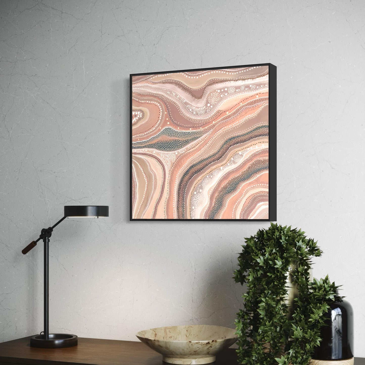 Marrinpa Aboriginal dot painting printable in earthy neutrals framed on light stone wall above wooden console with greenery, lamp, and decor