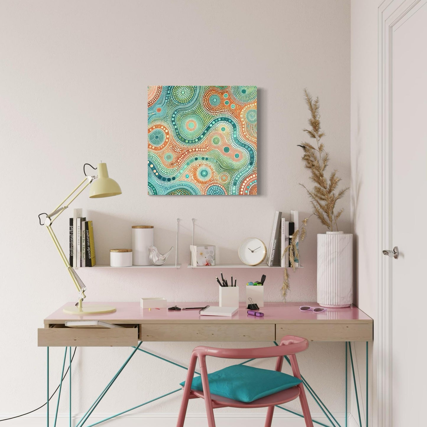Ngapa Kuruwali Aboriginal dot painting printable displayed above modern pink desk with aqua chair, books, and creative workspace decor