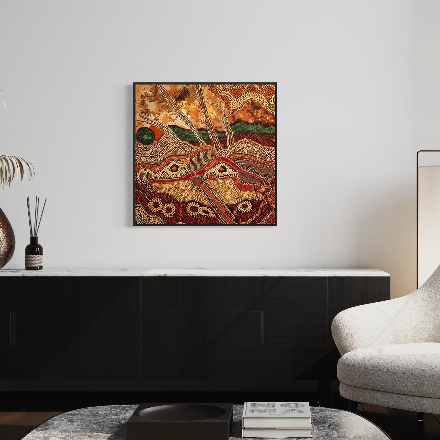 Dreaming Landscape Aboriginal dot painting printable in earthy tones framed on light wall above black console with modern vases and decor