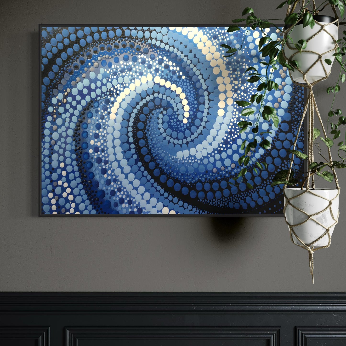 Garran Wurali Aboriginal dot painting printable in ocean blues framed on dark grey wall with hanging indoor plants in macrame holders