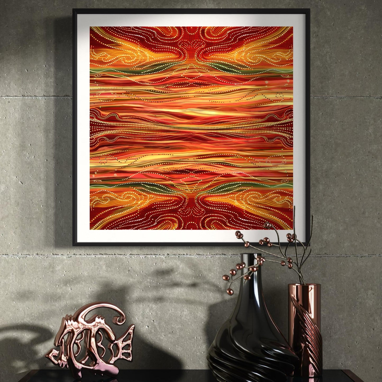 Yurala Flames Aboriginal dot painting printable in rich reds and golds, framed and displayed on a textured concrete wall above a black console with bronze vases and decor.