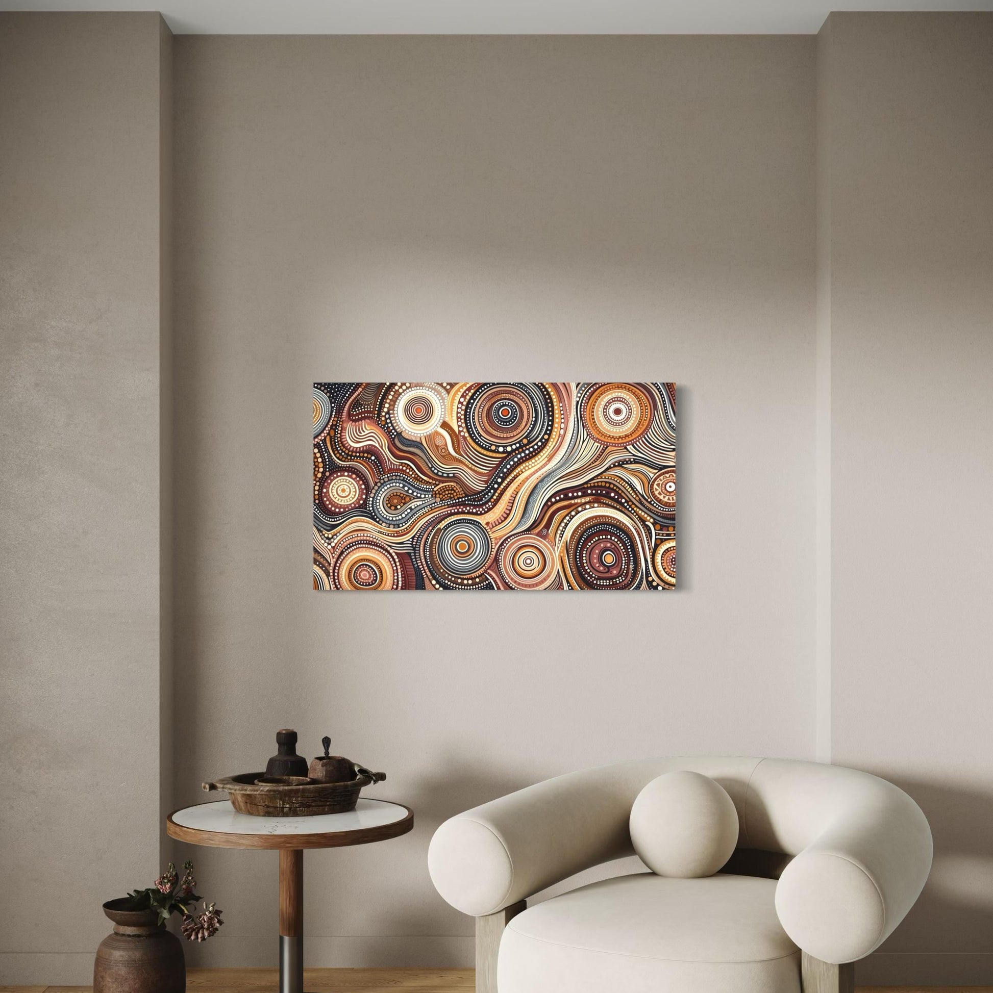 Walu Wirin Aboriginal dot painting horizontal print unframed, displayed above a round wooden table with rustic decor and beside a curved cream armchair in a minimalist living space.