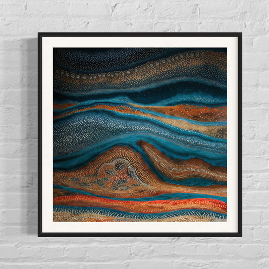 Karli Flow Aboriginal dot painting printable in black frame on white brick wall, showcasing deep blue and earthy tones with fluid, wave-like patterns.